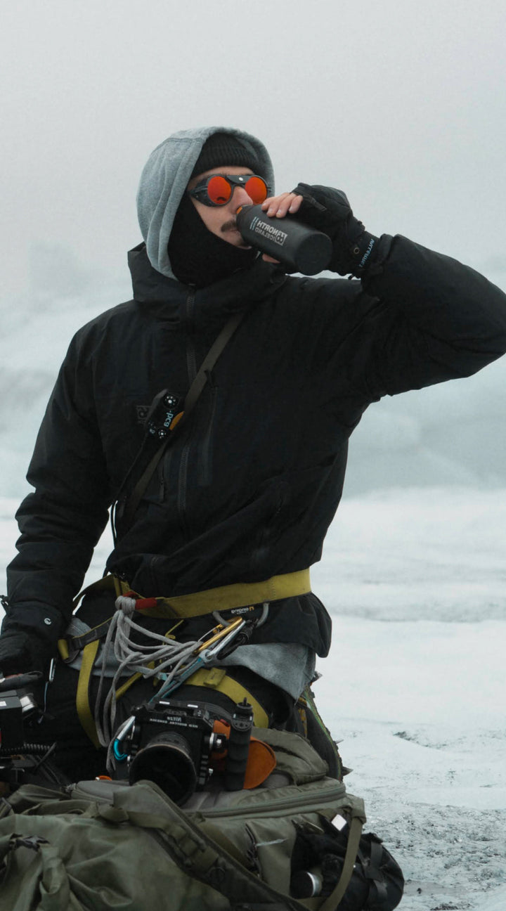 Man wears Heron Glacier side shield sunglasses while exploring polar regions for maximum eye protection