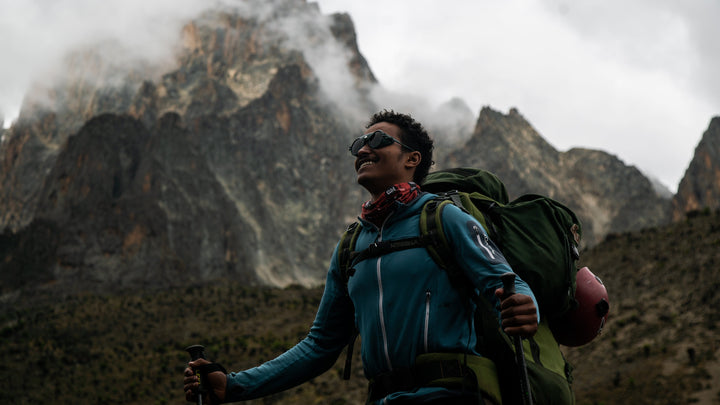 Peter Naituli climbs Mount Kenya barefoot while wearing VALLON Heron Mountain mountaineering sunglasses