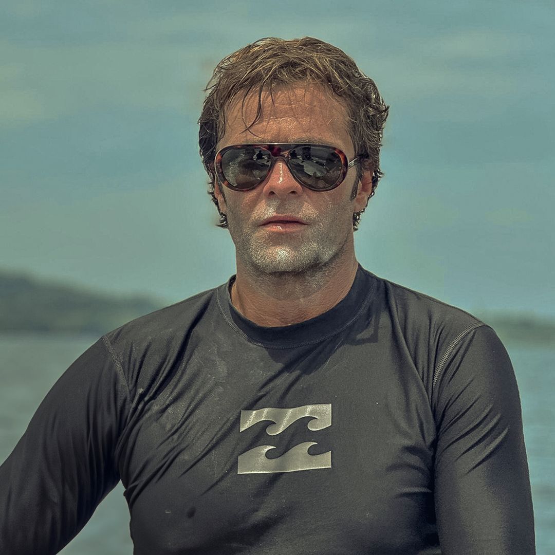 Surfer wears VALLON Surf Aviators sunglasses in Dark Tortoise