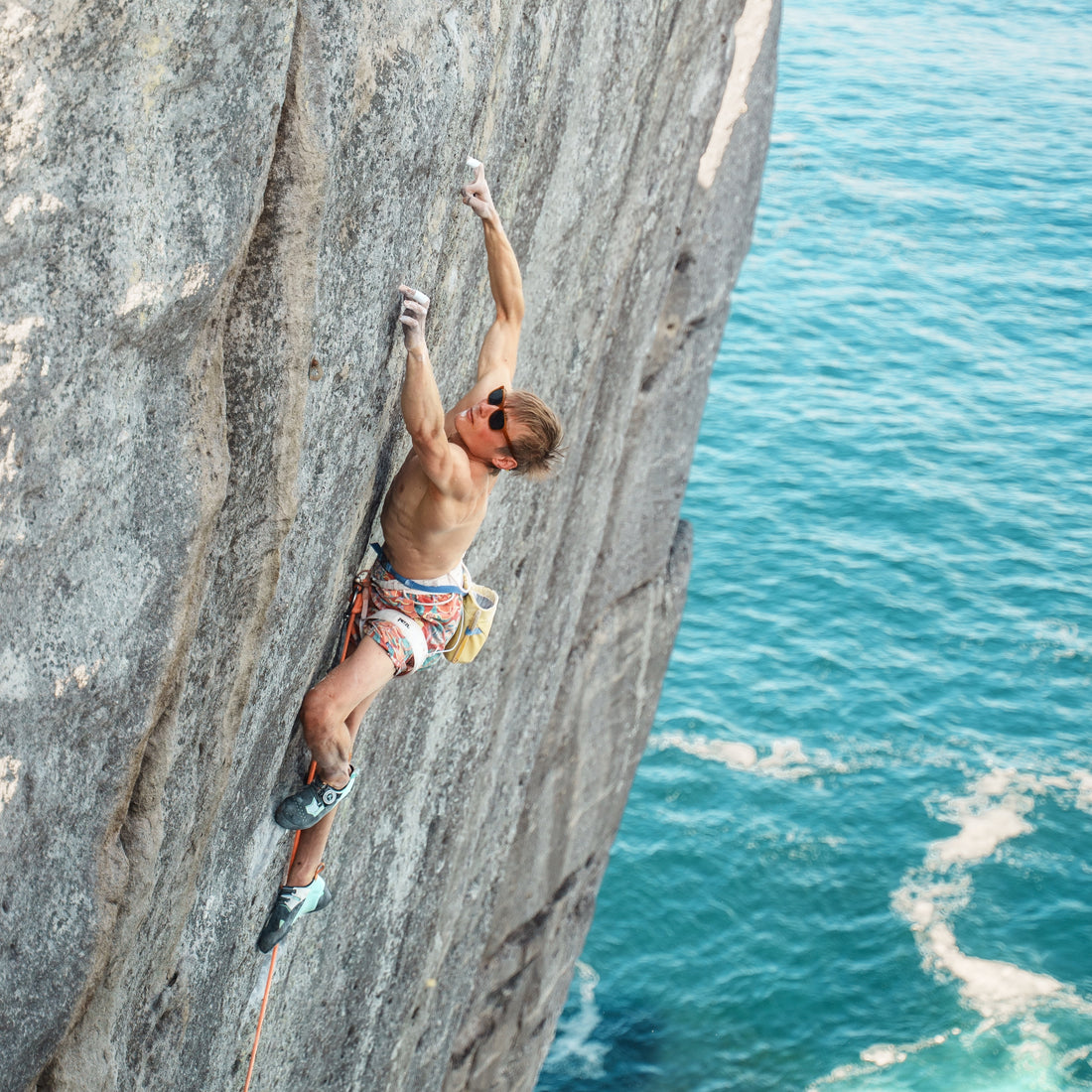 World leading sports climber Alex Megos wears VALLON Daytrippers Megos Edition while climbing off the coast of Australia