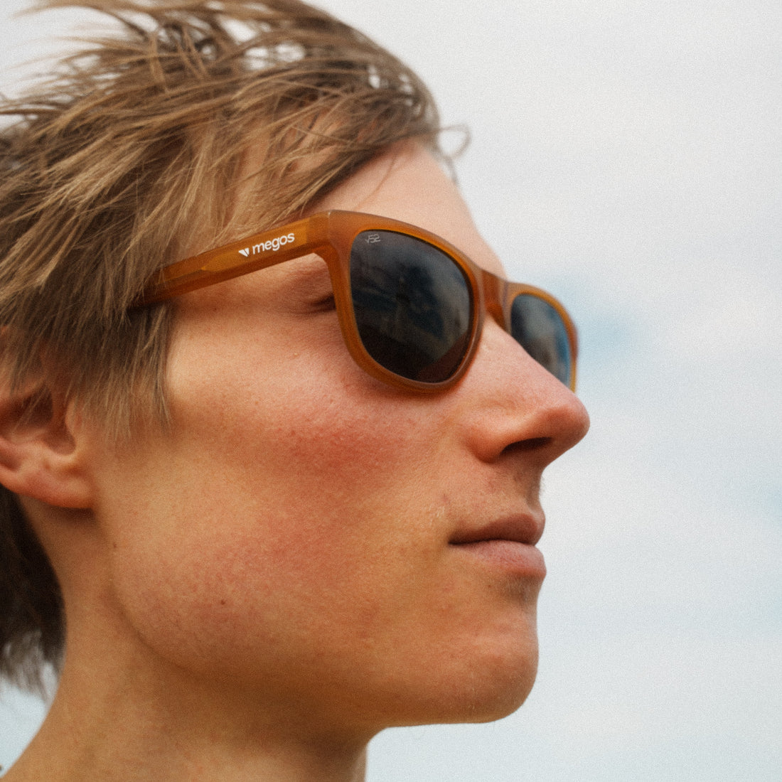 Alex Megos wears Daytrippers from VALLON in amber yellow, with Megos logo in white on the temple