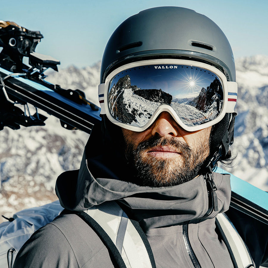 Ski goggles with helmet top