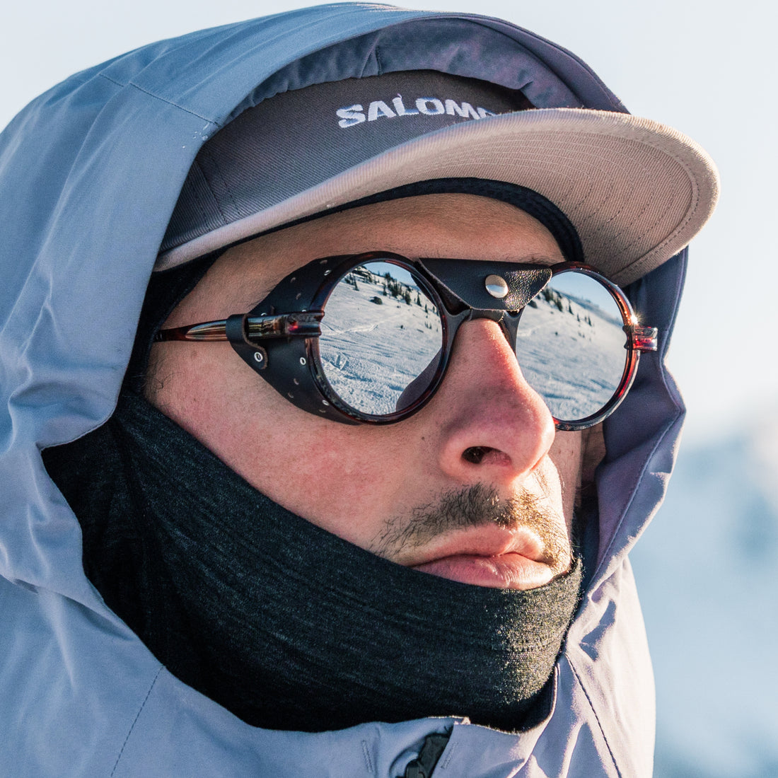 Man wears Heron Glacier side shield sunglasses Rx model in tortoise