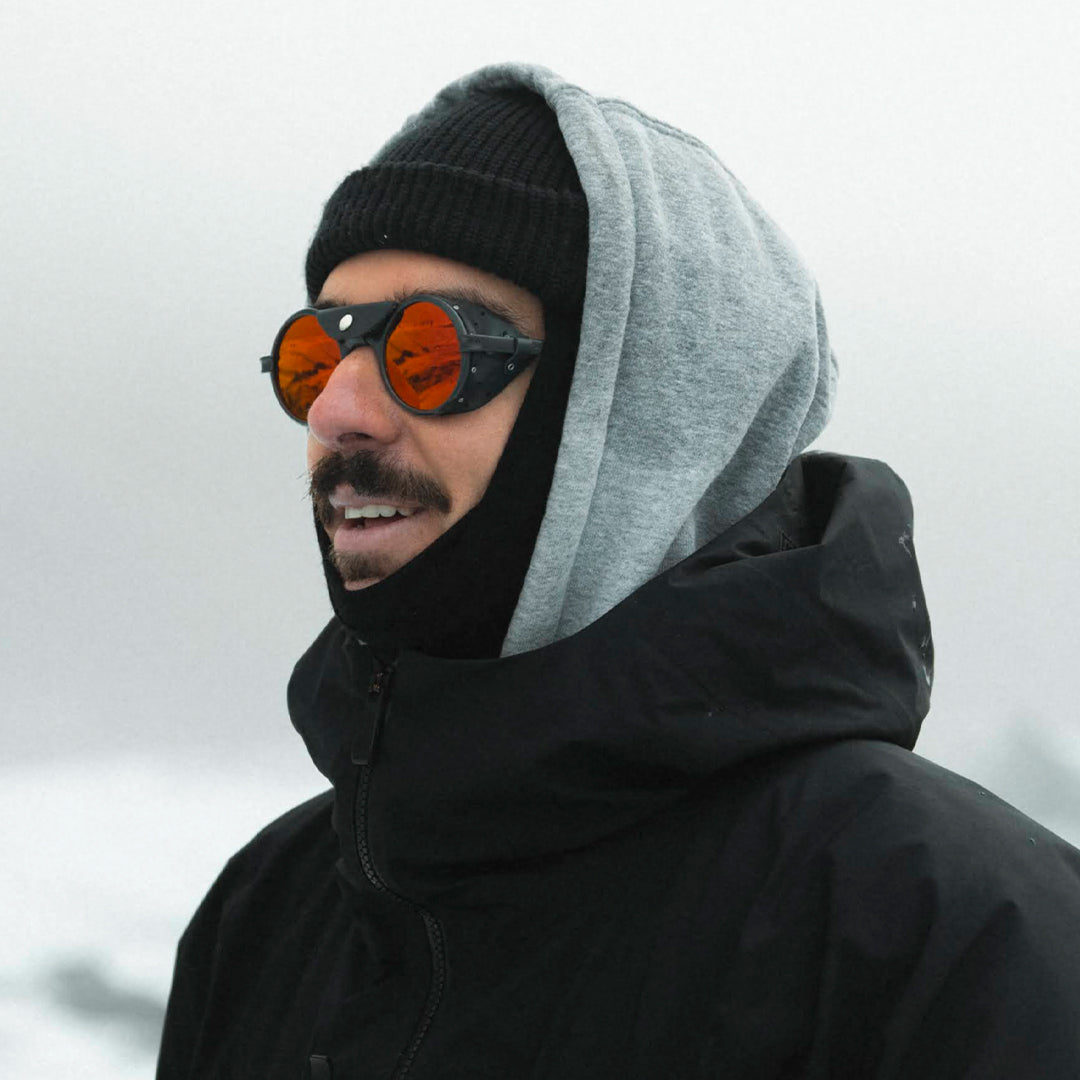Man wears Heron Glacier Cat. 4 sunglasses from VALLON in Iceland glacial landscape