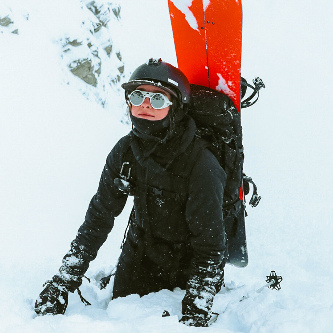 Woman wears Heron Glacier Rx sunglasses in off-white