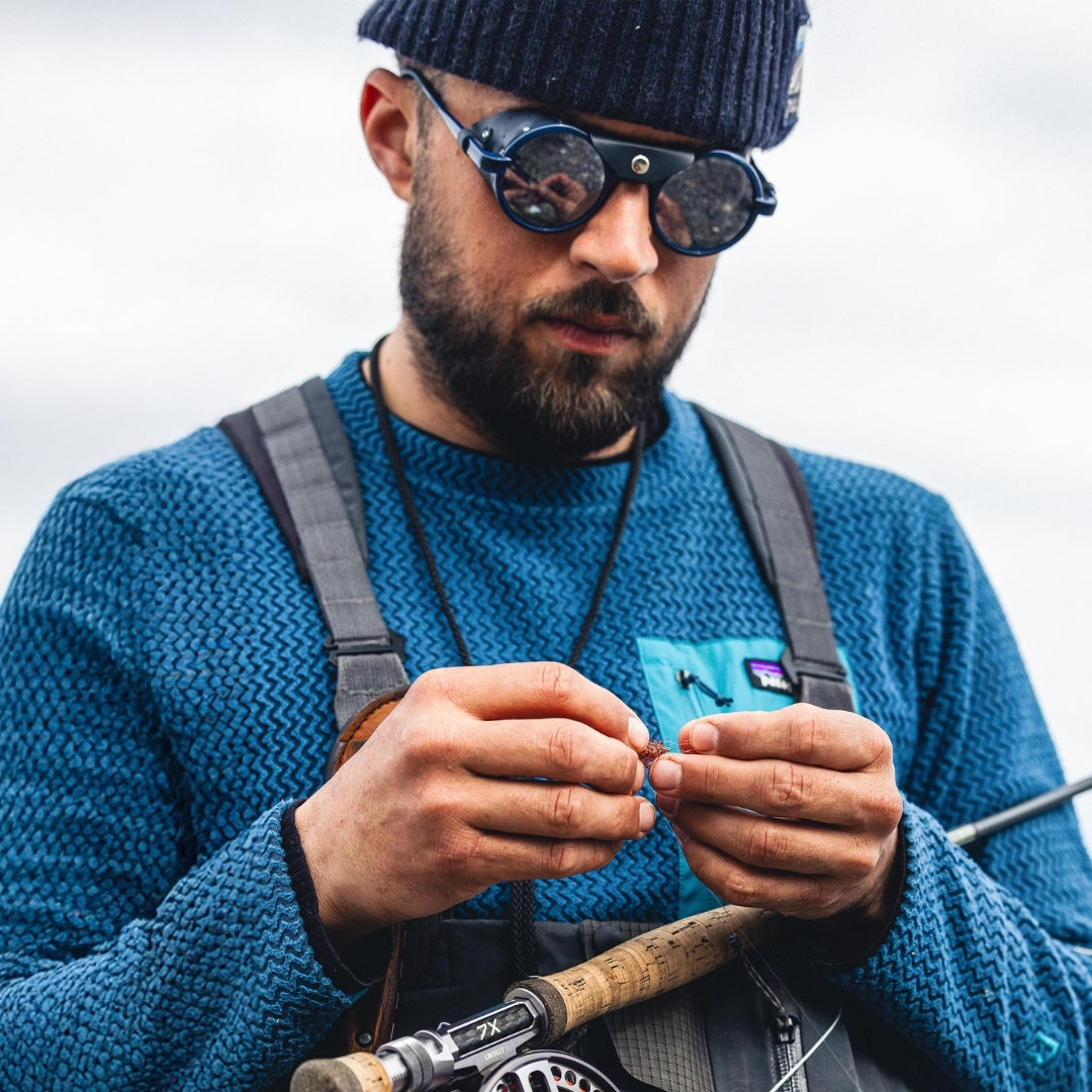 Man wears Heron Ocean sunglasses from VALLON for fishing