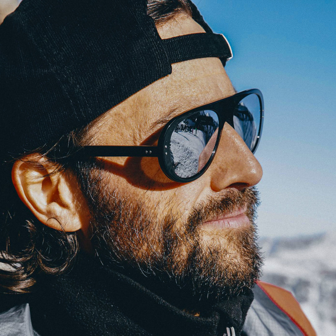 Man wears VALLON Ski Aviators sunglasses in Black colorway