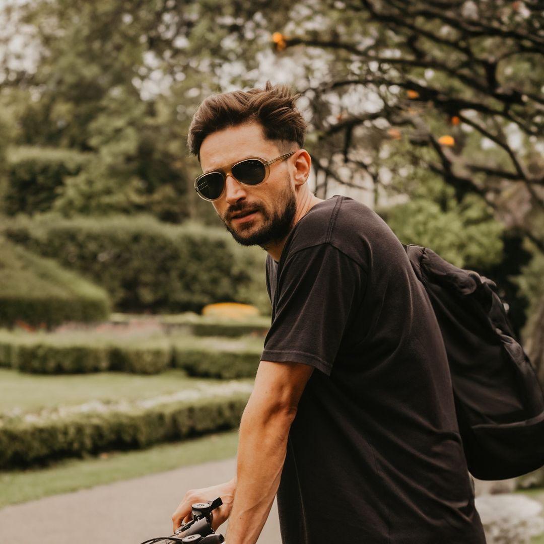 Man wears VALLON Surf Aviator sunglasses in Sage