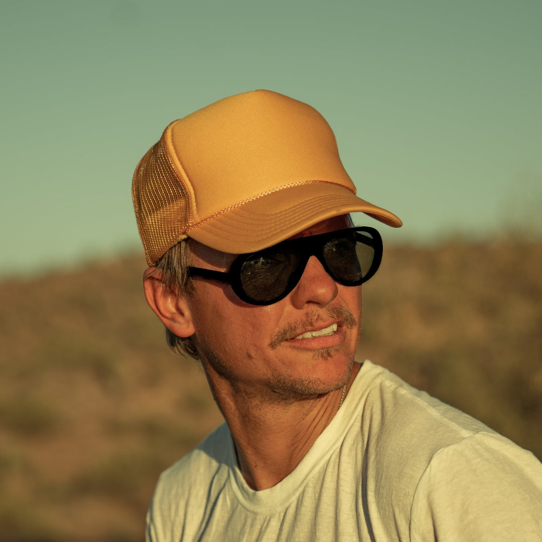 Man wears VALLON Surf Aviators polarized sunglasses
