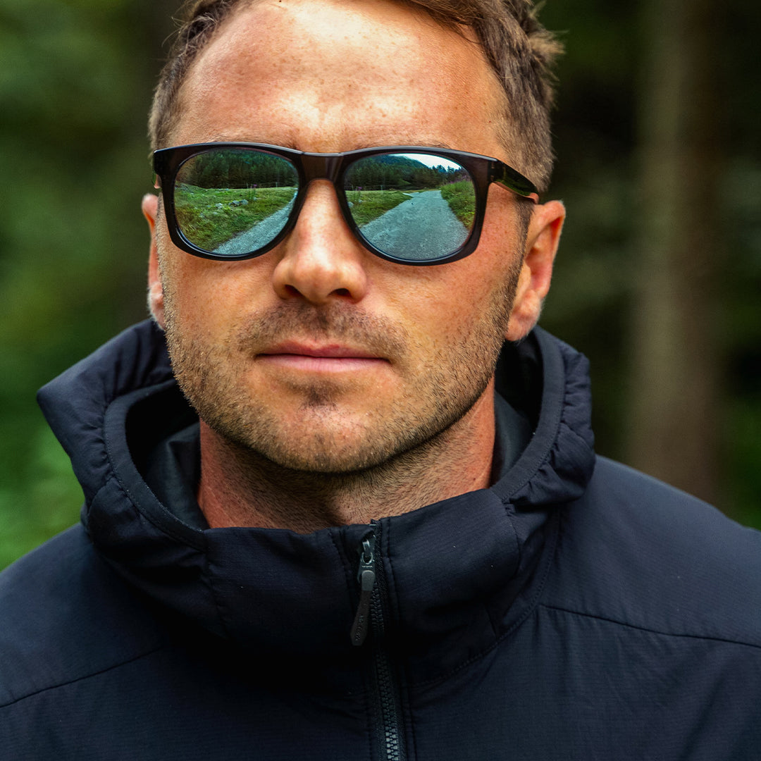 Man wears Ventures sustainable sports sunglasses from VALLON