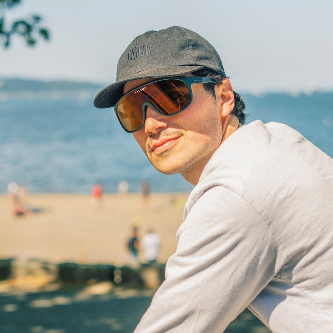 Man wears VALLON Watchtowers shield sunglasses with sustainable frames and ZEISS optics