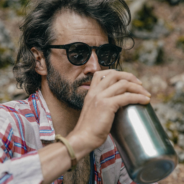 Man wears Waylons Rx sunglasses from VALLON for hiking