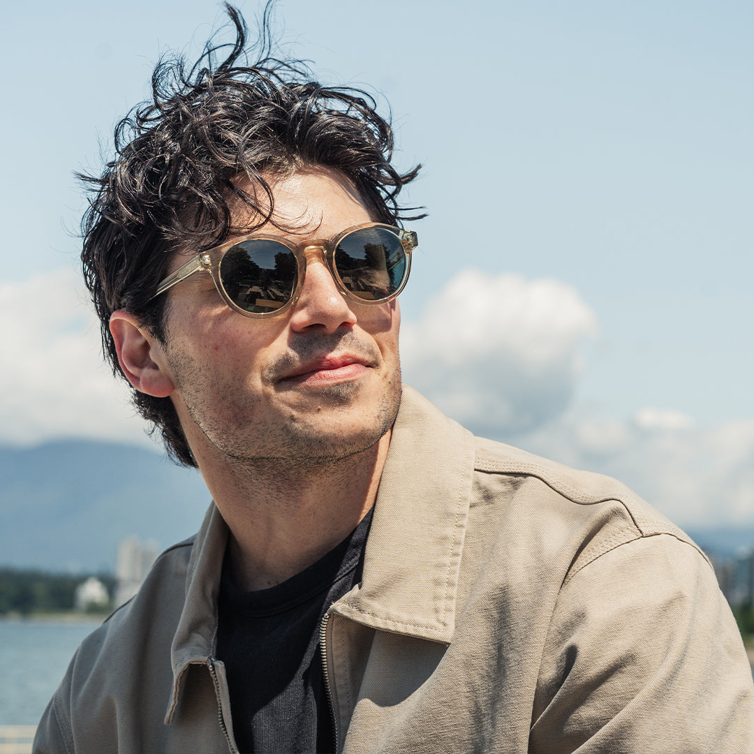 Man wears VALLON Waylons round acetate sunglasses in Sage