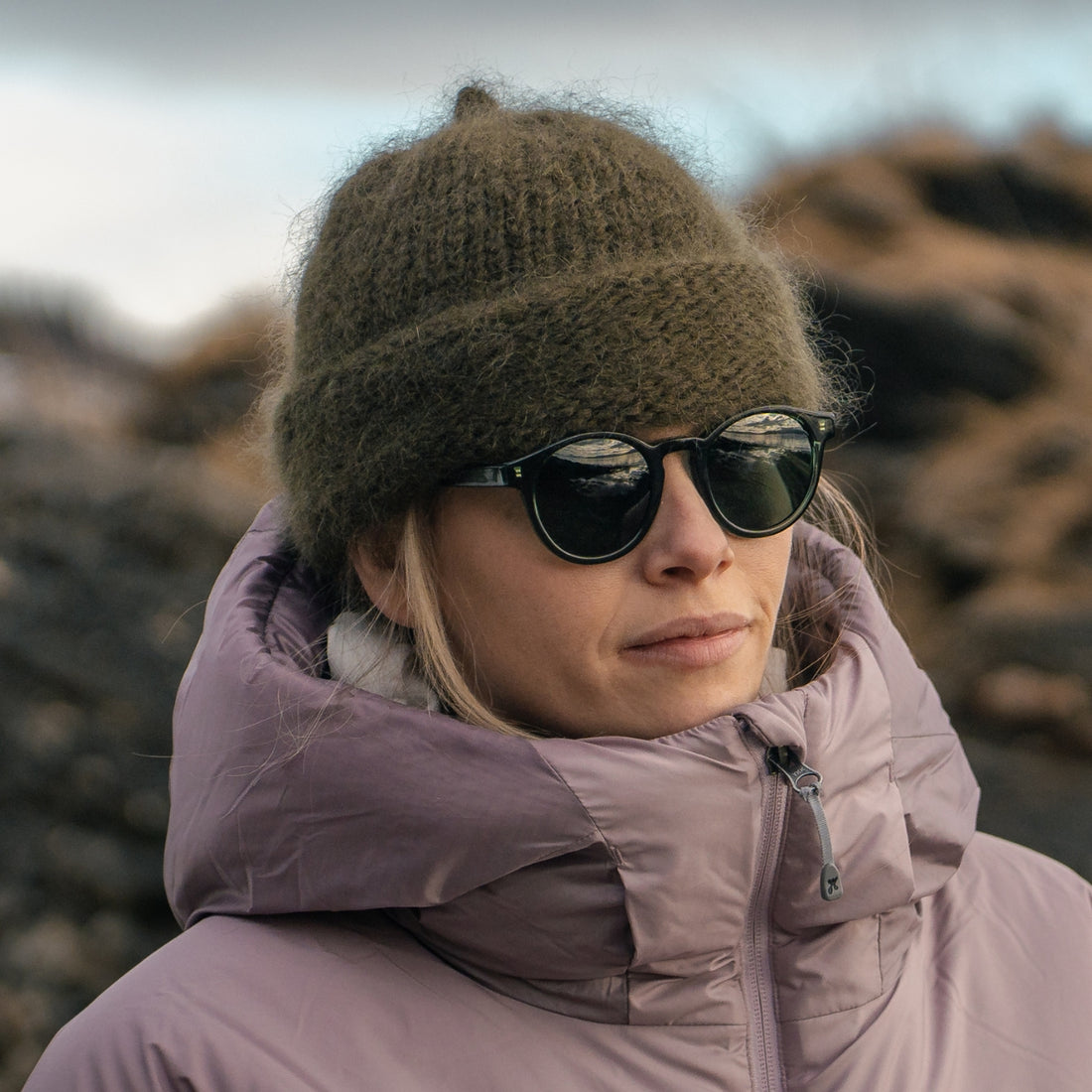 Woman wears VALLON bestselling Waylons round acetate sunglasses in winter