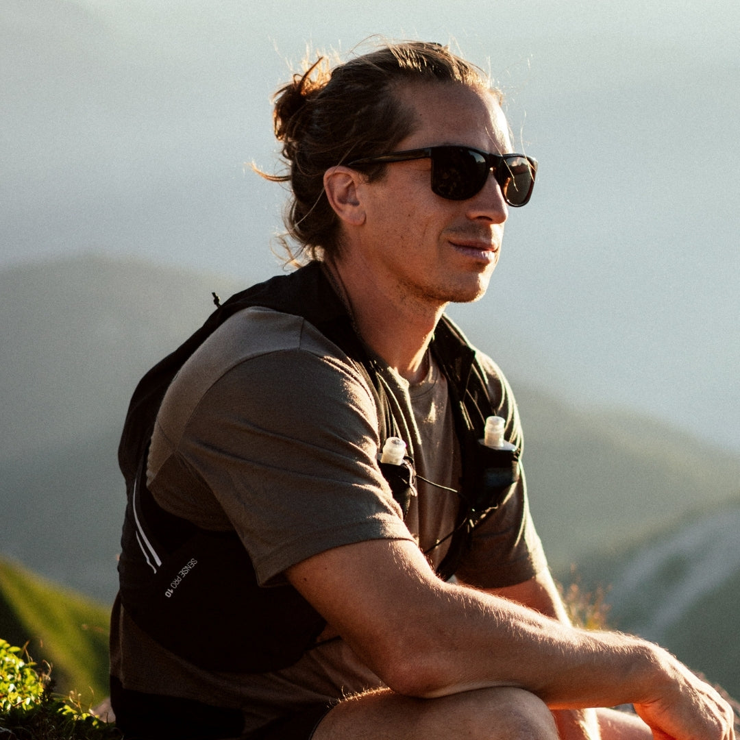Male trail runner wears Ventures lightweight sports sunglasses from VALLON with polarized Cat. 3 protection and sustainable frame