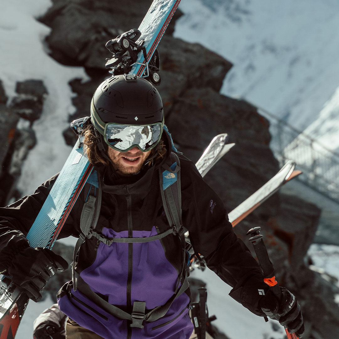 Man wears Classic 80s-style Freebirds ski goggles from VALLON while ski touring